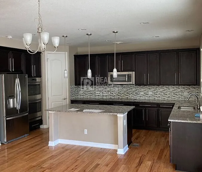 5028 S Versailles Cir — Photo 11