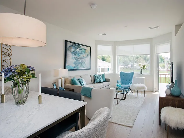 Living Room with Bay Window & Balcony