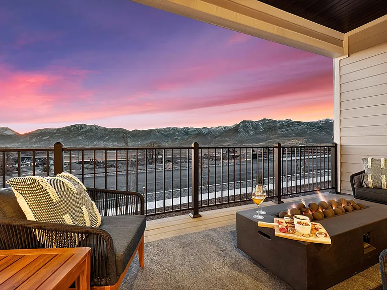 Upstairs covered patio off of the kitchen and living room. And those views of The Mount Timpanogos Range.