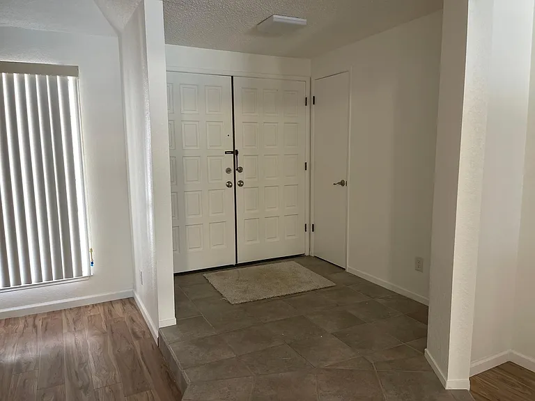 Main entarnce with foyer and small umbrella or coat closet