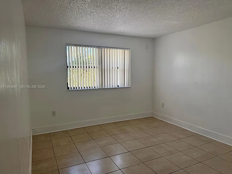 7595 NW 179th St #119 — Photo 13