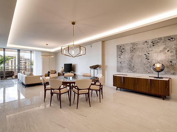 Notice the floor to ceiling Glass Doors leading to the outdoor Terrace. These doors are 9 9 tall and 12 wide. A wonderful surprise awaits you on the Terrace that overlooks the 78 long Pool!