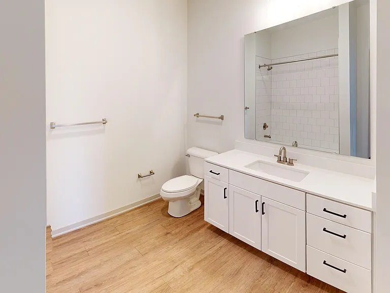 The Henry II offers a spacious bathroom with custom shelving for linens. The Henry II offers a spacious bathroom with custom shelving for linens.