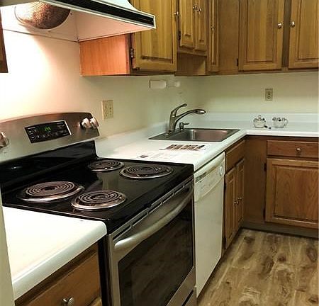 Workable kitchen with newer oven and new flooring!