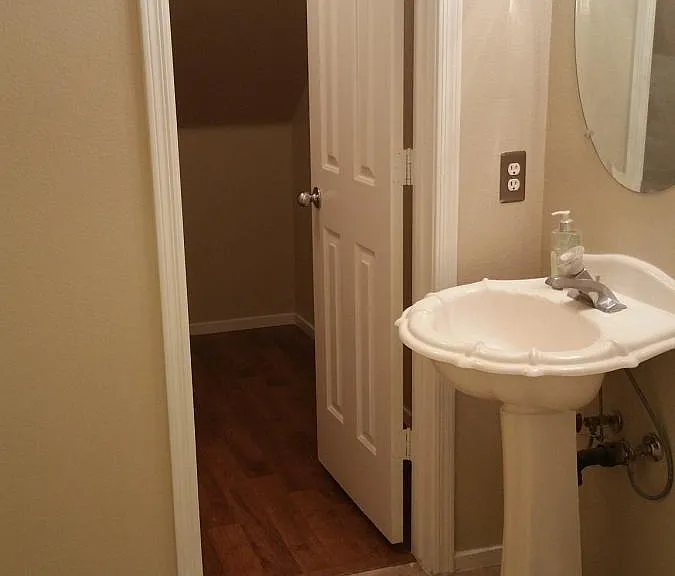 Downstairs Half Bath with Under Stair Storage