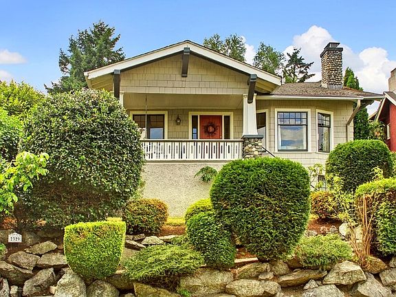 Located on one of Mount Baker's prettiest tree-lined streets, this grand craftsman just celebrated h