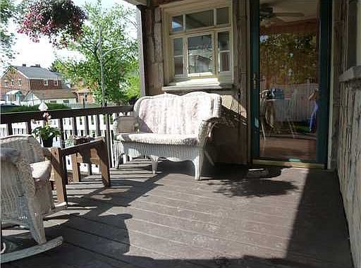 Relax on this peaceful covered porch!