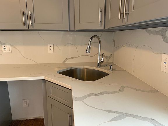 Quartz counter and matching backsplash