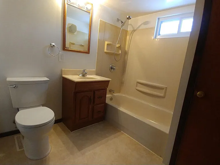 Full bath with storage closet