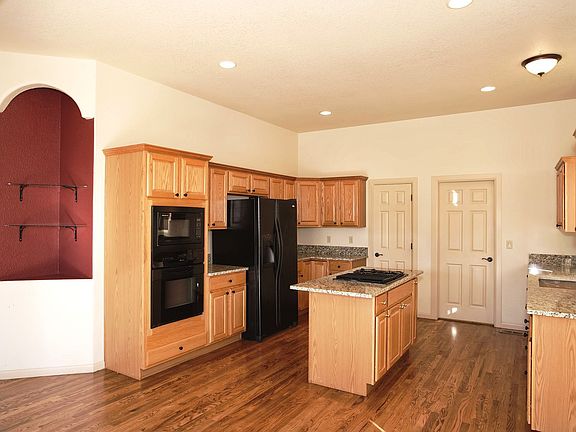 Updated Kitchen with Slab Granite & Refinished Hardwood