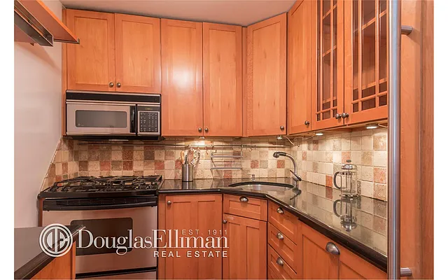 Sold by Douglas Elliman | media 17