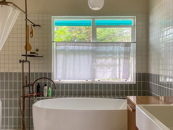2nd floor renovated bathroom 
handcrafted copper shower and beautiful bathrub