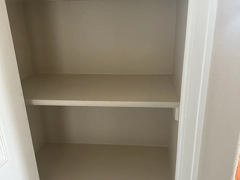 Upstairs linen closet in hallway.