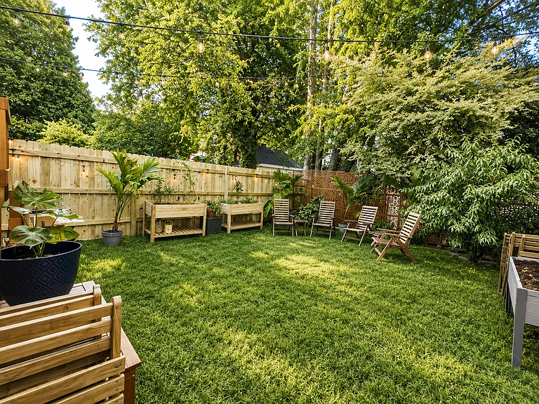 Enjoy the outdoors with your private back deck and backyard!