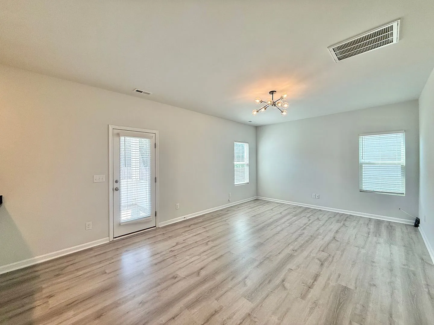 Modern 4BD, 2.5BA Knightdale Home with a Fenced Yard & Screened Patio — Photo 4