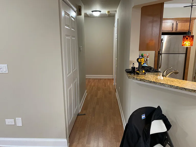 Hall way leading to master bedroom and bathroom