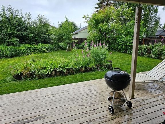 back lower deck and back yard in June