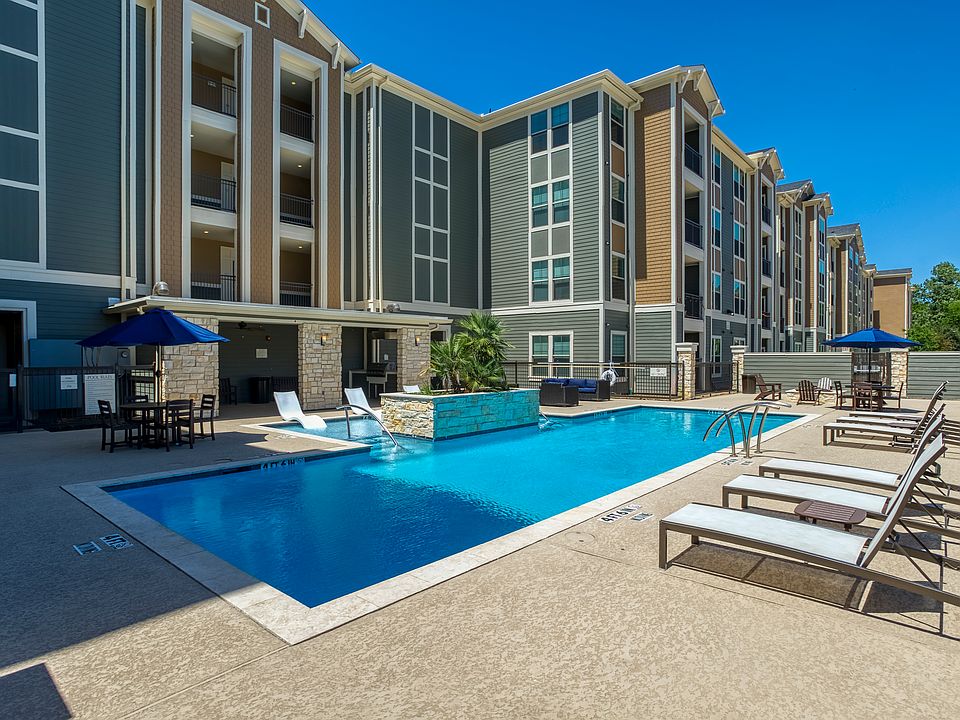 Resort Style Swimming Pool with BBQ grills