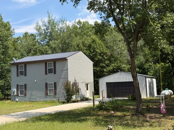 7936 S Rountuit Ln, Howard City, MI 49329