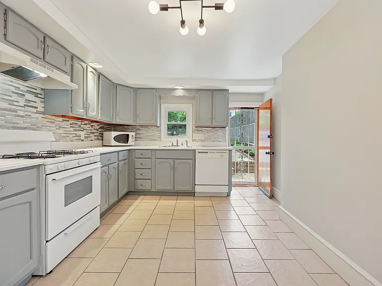 Kitchen with Rear Yard access.