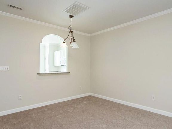 convenient window that connects kitchen & dining