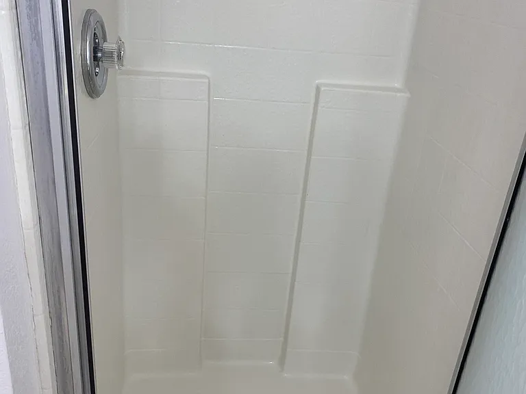 Second bath step-in shower.
