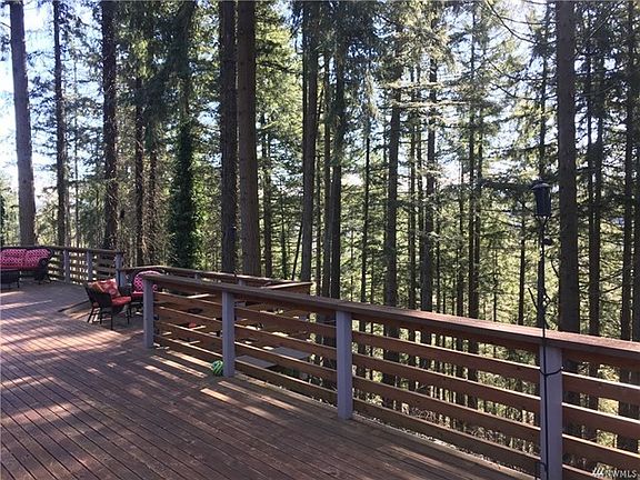 Back deck with territorial and river views