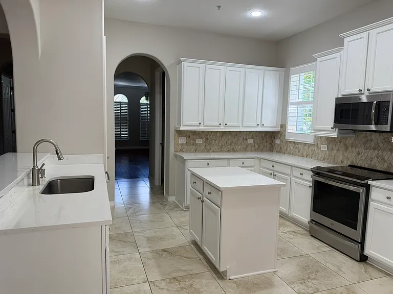 Kitchen with view to the dining room and living room