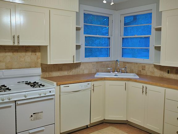Kitchen Sink, with lots of light from two windows original to the house.