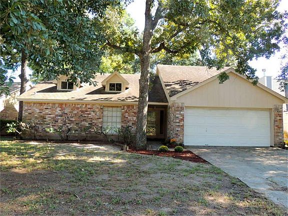 Inviting three bedroom home with mature trees in established neighborhood convenient to Hardy Toll R