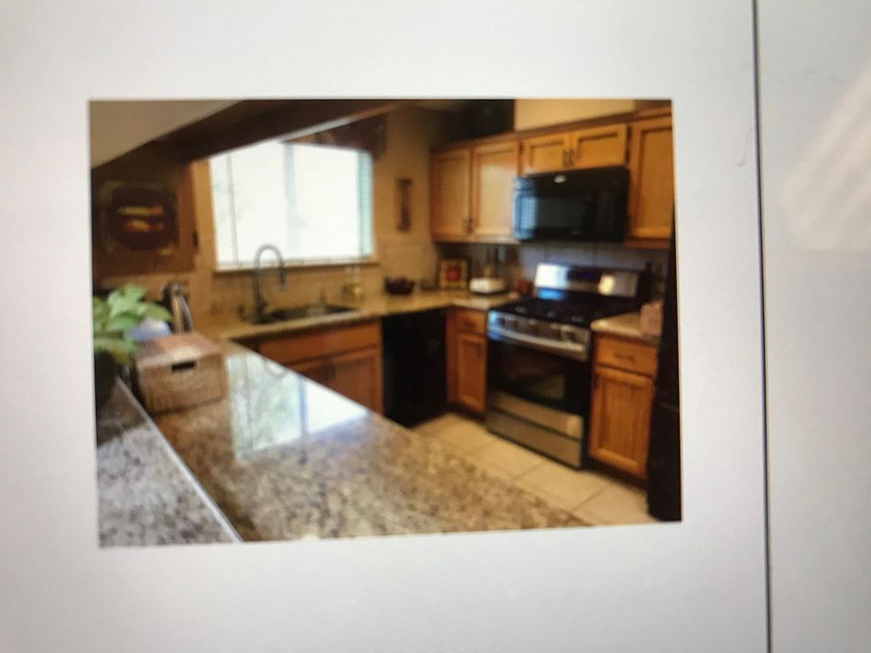 1st image of 10553 E 35th St