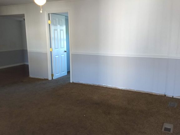 Living room, door to office