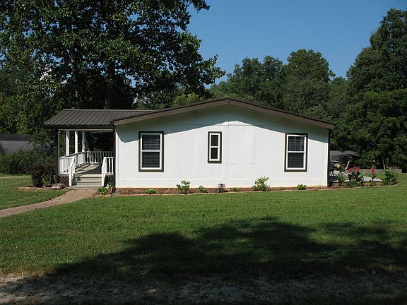 Side Exterior and Walkway to Entrance