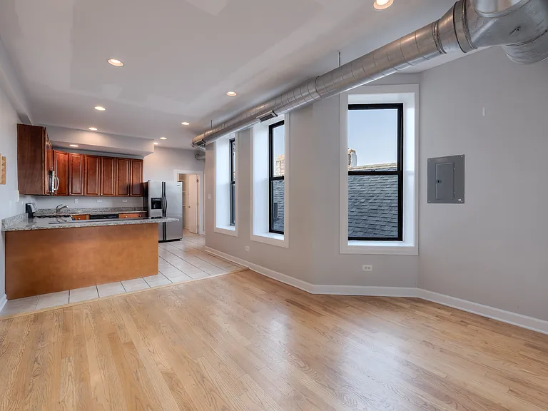 Kitchen opens to living room