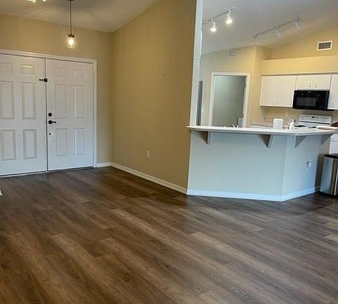 LIVING ROOM LOOKING AT KITCHEN