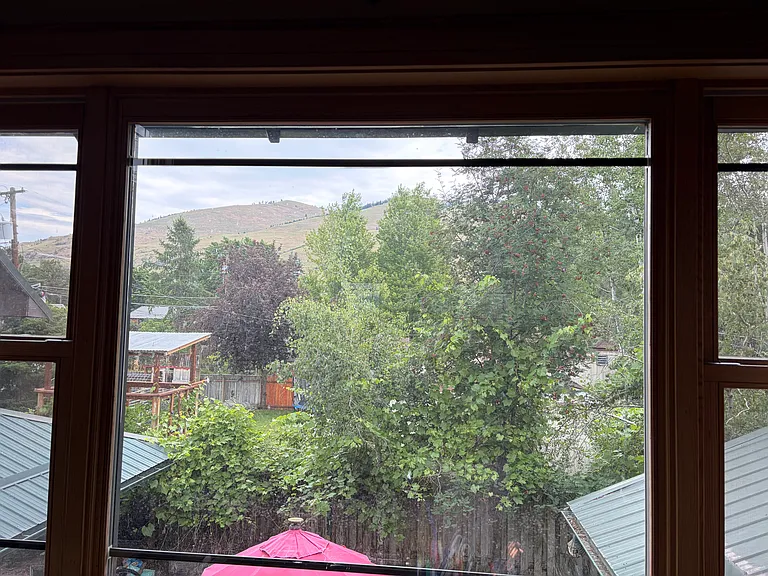 Second bedroom overlooks patio and MT Sentinel.