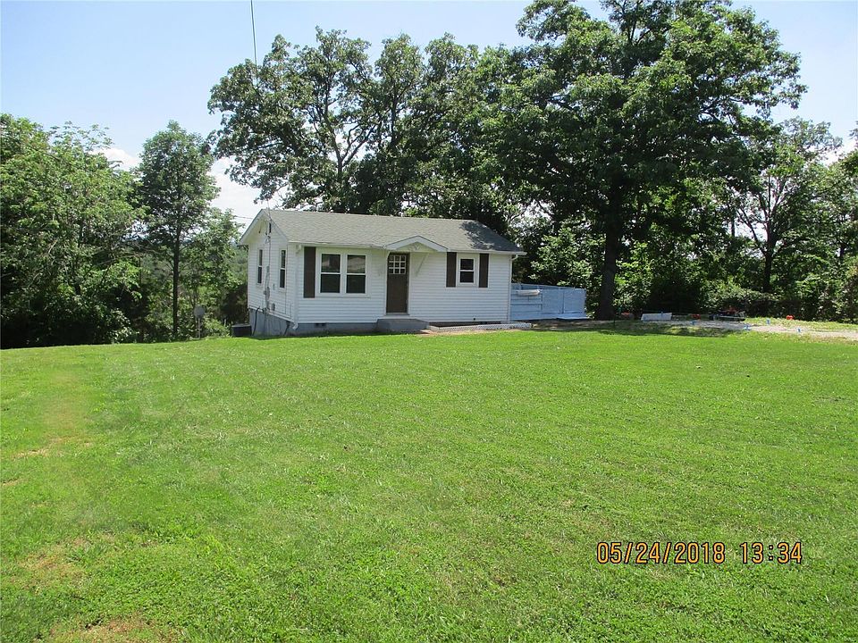 The property has a wonderful view of the property below in the back.