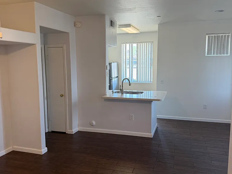 Open living area flows to kitchen