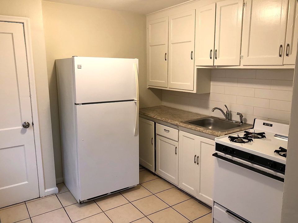 Kitchen, tile flooring, fridge, oven/range