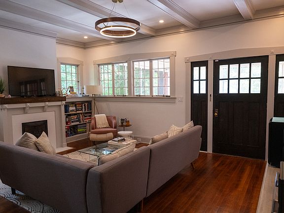Living room with great natural light. Hardwoods are currently being refinished.
(furnishings not included)