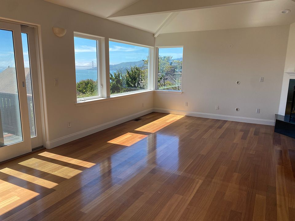 Beautiful hardwoods, light and airy, peaceful and completely private living room...