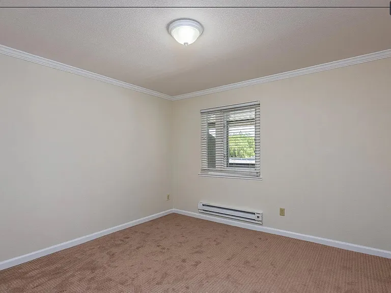 Second bedroom with window.