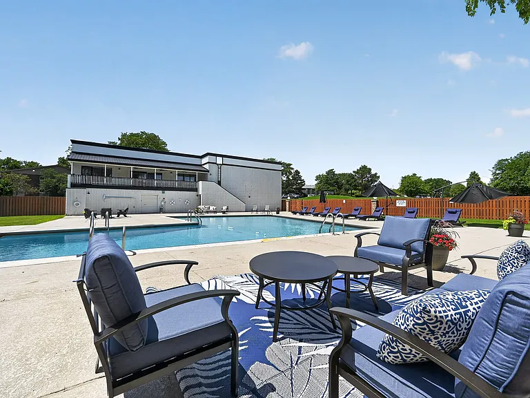 Relax poolside in comfortable seating at Renaissance at Carol Stream in Carol Stream, IL.