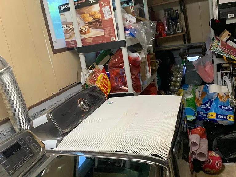 laundry room with storage space