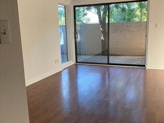 Ground floor living room, with access to large, private patio.