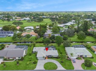 416 Muirfield Dr, Atlantis, FL 33462