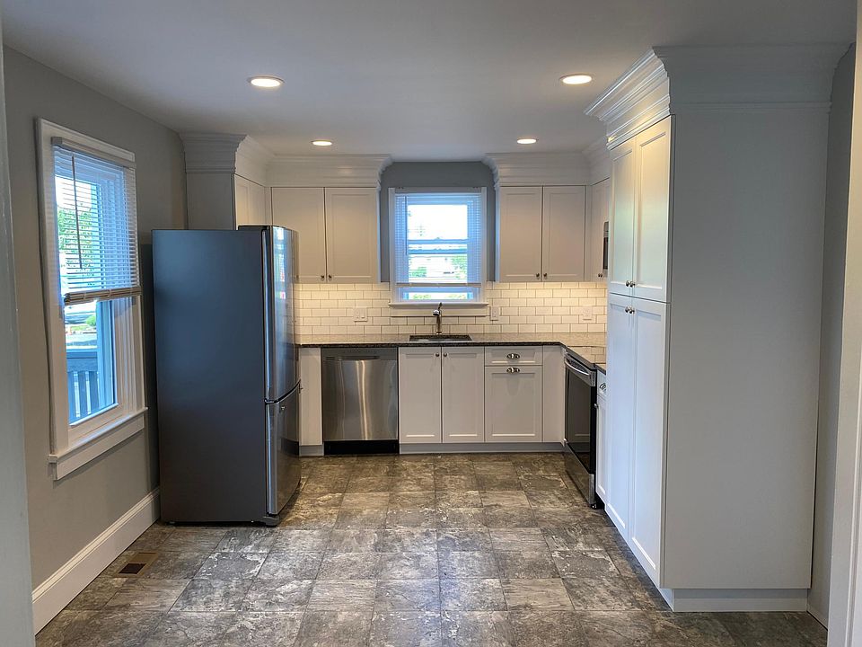 Brand new everything in this custom kitchen! Crown molding, granite counter tops, subway tiles. Dishwasher, microwave, range and fridge Large pantry. Dimensions: 17' x 11'