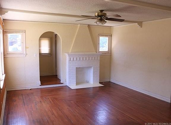 First floor unit has gorgeous wood floors