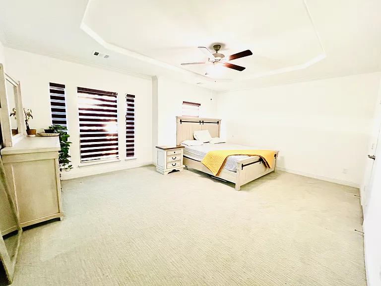 Master bedroom with a stunning lake view