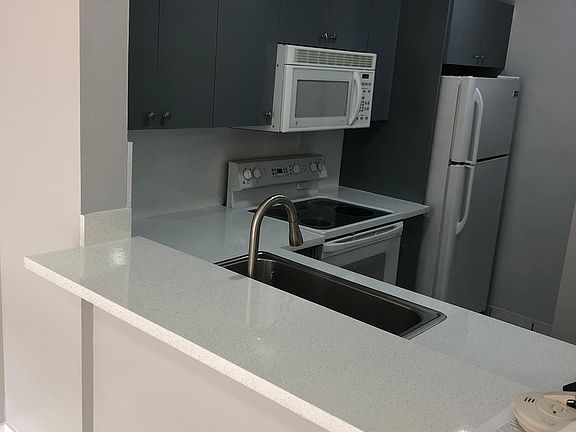 4th image of 6070 W 18th Ave APT 212
